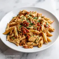 Instant Pot Tuscan Chicken Pasta: Creamy and Garlic-Forward