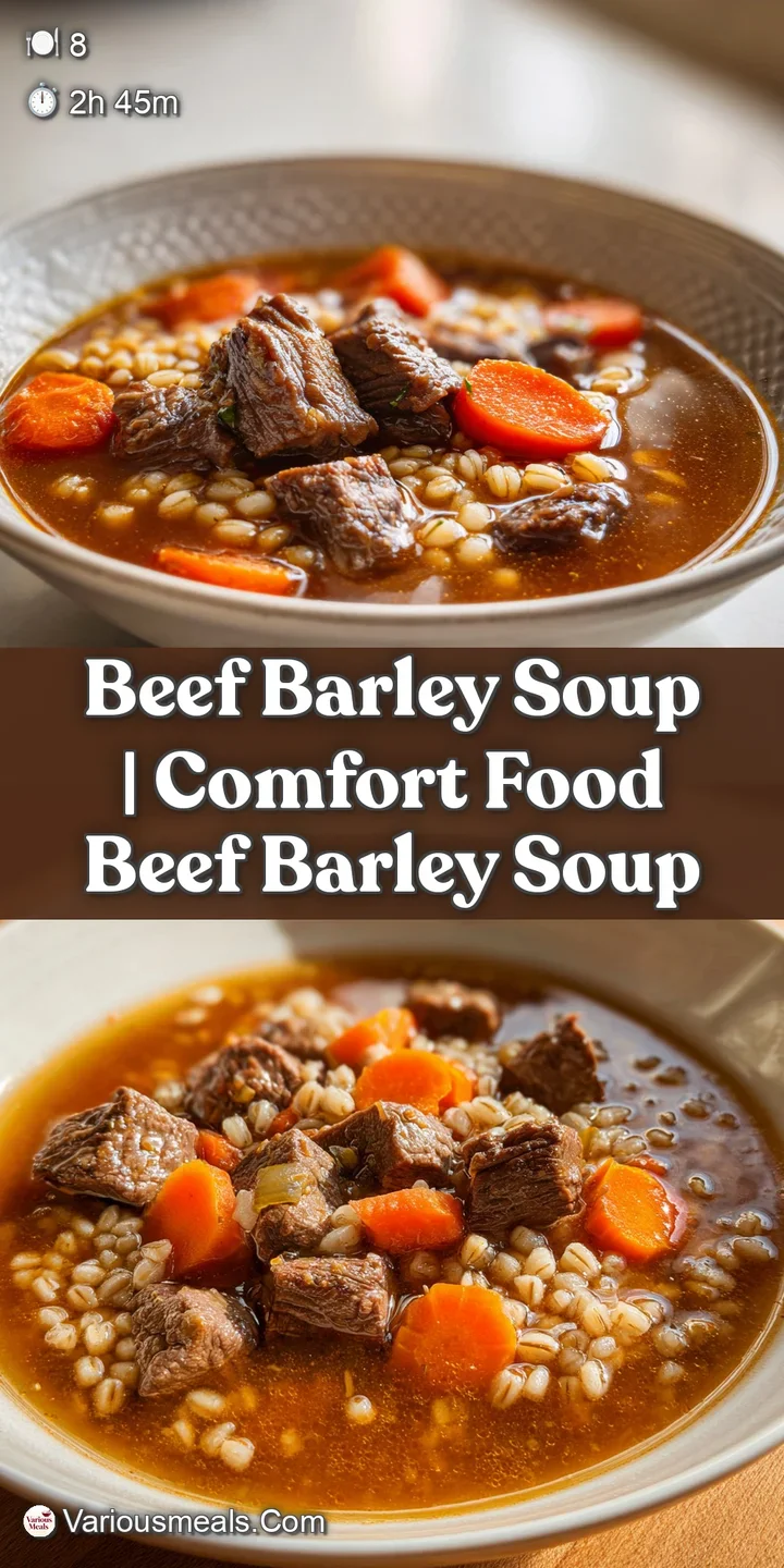 Close-up of tender beef and plump barley glistening in a savory amber broth with soft carrots and aromatic herbs.