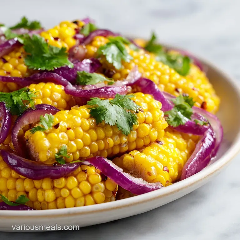 Small ceramic bowl of golden corn and red peppers served beside a stack of salted, crispy tortilla chips on wood.