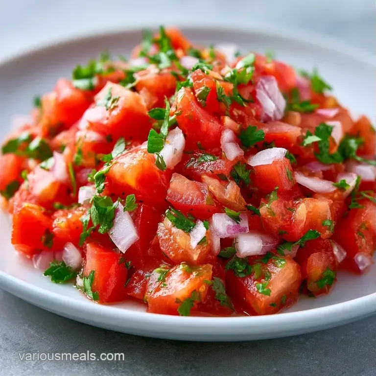 A rustic ceramic bowl of fresh salsa paired with golden toasted tortilla chips on a weathered wooden tabletop