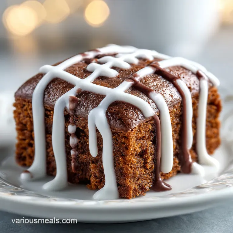 A single football brownie on a white plate with swirled white icing, creating a delicious-looking individual dessert.