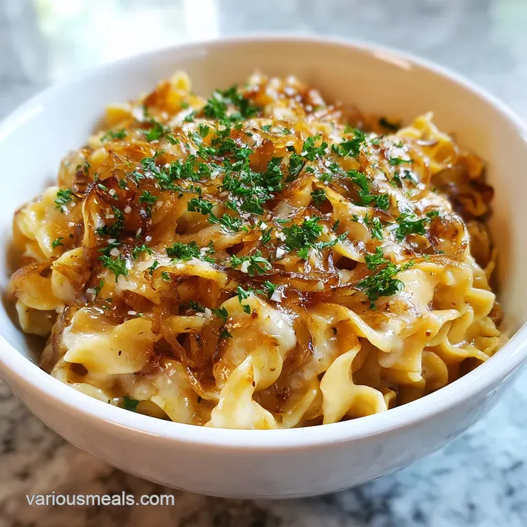 Elegant plate of glistening pasta, strands coated in a rich sauce. Toasted breadcrumbs add a delightful textural contrast.