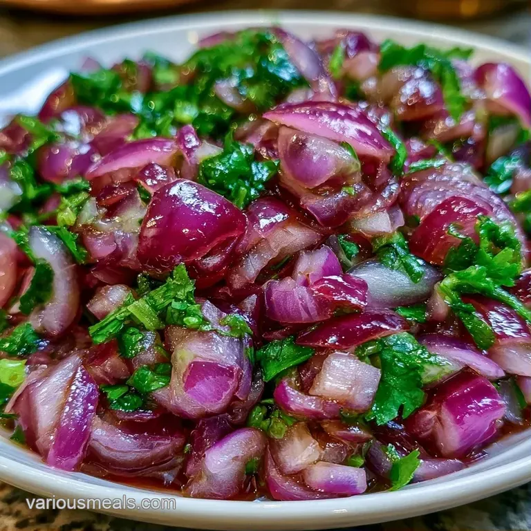 Vibrant purple and green vegetable relish in a white bowl paired with a side of golden, crispy tortilla chips.